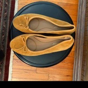 Mustard yellow suede ballet flats.